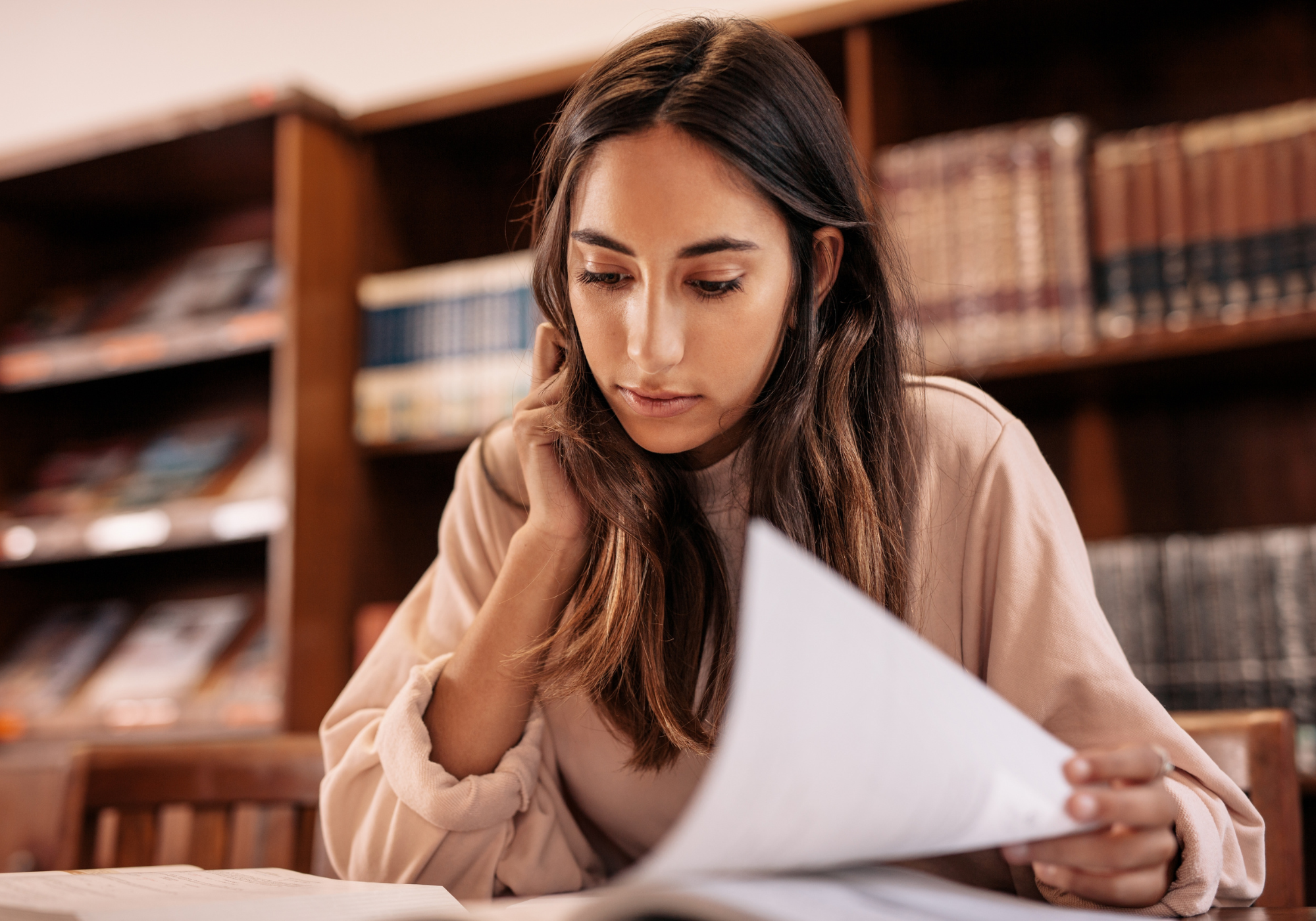 college student studying in library 