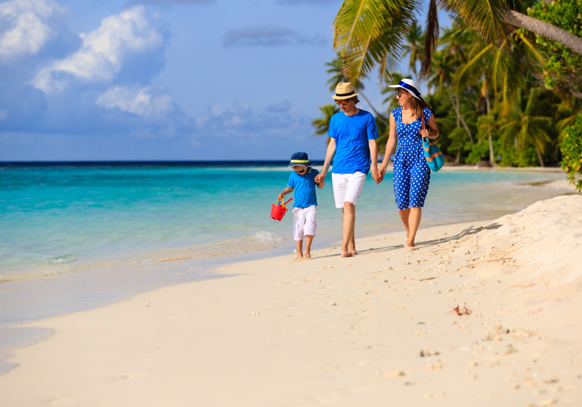 family on budget friendly spring break vacation at the beach