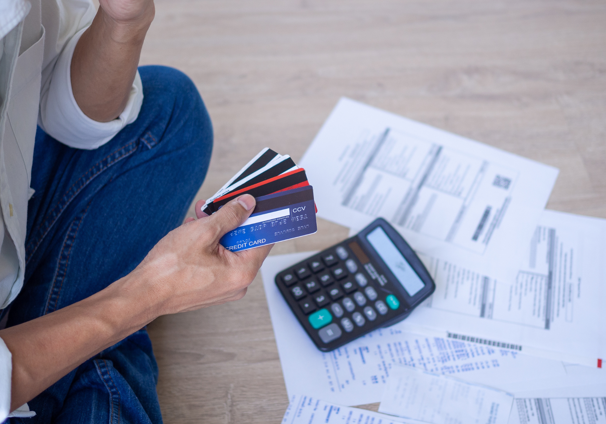 person reviewing credit card statements