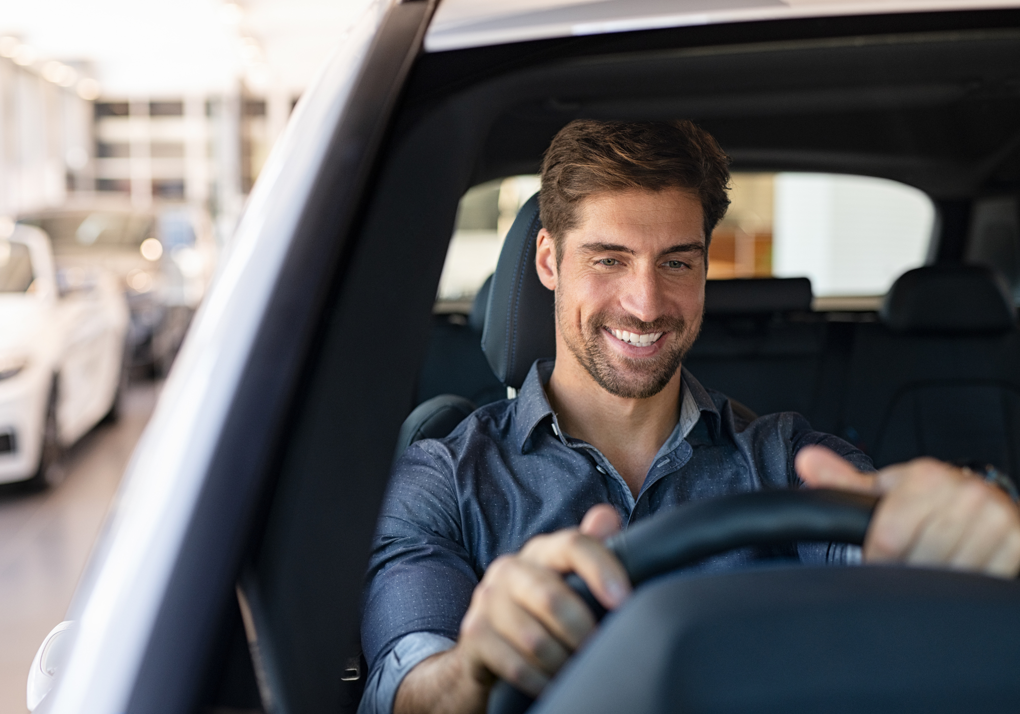 Man driving newly purchased vehicle in California. 